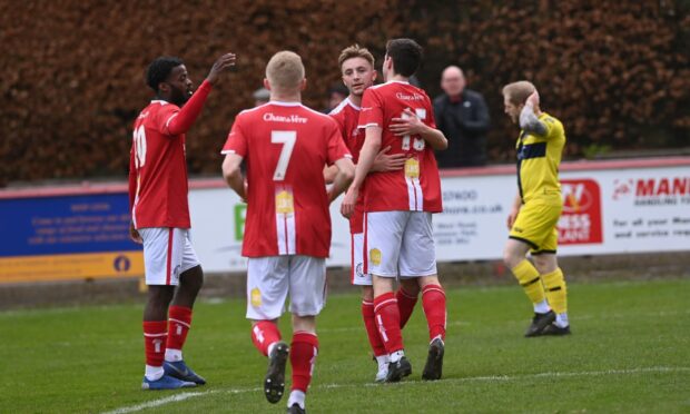 Brechin City striker Grady McGrath is congratulated after scoring the second against Wick Academy. Image: Darrell Benns/DC Thomson