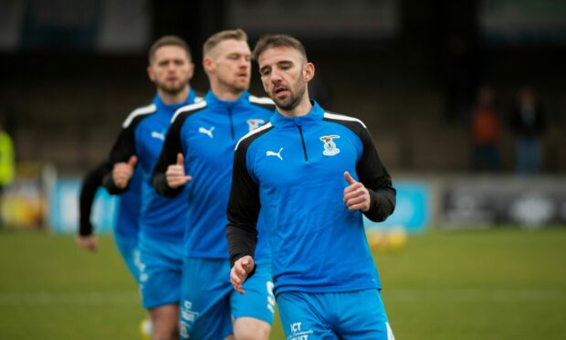Caley Thistle captain Sean Welsh, front, is available to face Morton this weekend. Image: SNS Group
