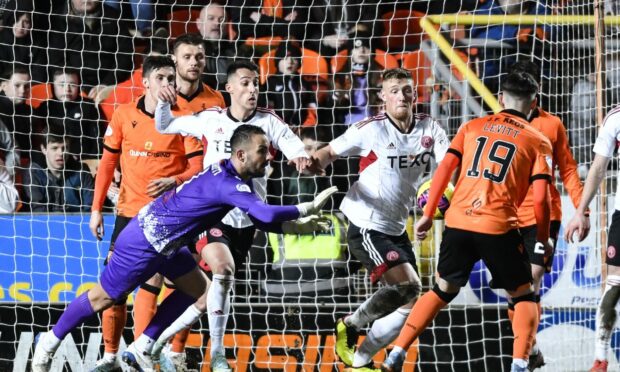 Dundee United's Mark Birighitti stretches for the ball during the recent match between Dundee United and Aberdeen. Image: SNS.