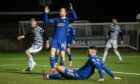 Cove Rangers defender Morgyn Neill turns the ball into his own net against Queen's Park. Image: SNS