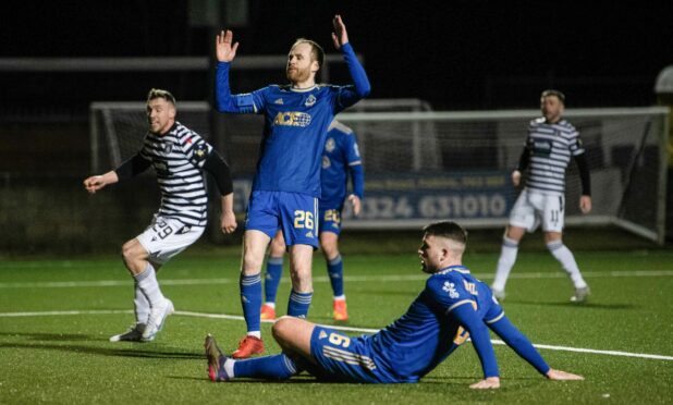 Cove Rangers defender Morgyn Neill turns the ball into his own net against Queen's Park. Image: SNS