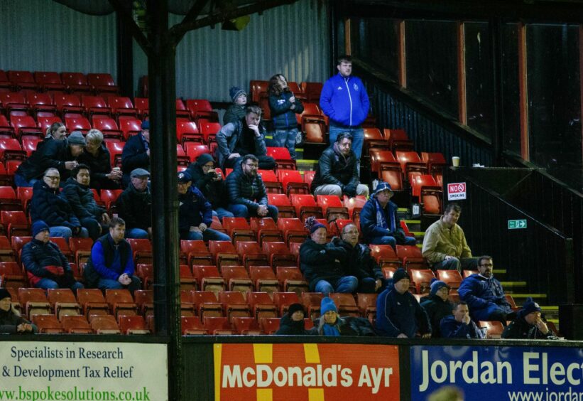 Cove Rangers supporters watch on at Somerset Park. Image: SNS