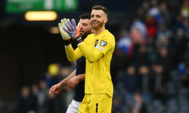 Scotland's Angus Gunn applauds fans at full time after beating Cyprus. Image: SNS