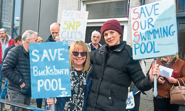 A protest held outside the Tivoli Theatre over the cuts to Aberdeen's libraries and swimming pools. Image: Chris Sumner/DC Thomson