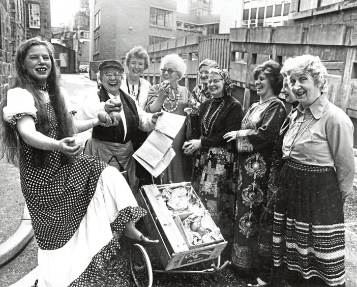 1978 - Members of the Stonehaven Townswomen’s Guild drama team pose outside Aberdeen Arts Centre where they were competing in the North-east of Scotland Federation of Townswomen’s Guilds Rally Drama Groups.