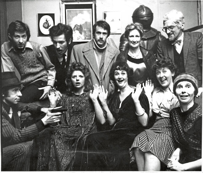 1978 - Members of Mannofield Players face the camera – and a gun – before they presented The Shop at Sly Corner at Mannofield Church Hall.
