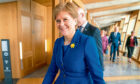Outgoing First Minister Nicola Sturgeon as she arrived for her last First Minster's Questions (FMQs) in the main chamber of the Scottish Parliament in Edinburgh. Image: Jane Barlow/PA Wire