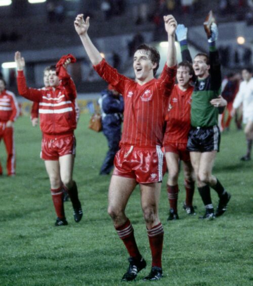 Aberdeen players celebrate in the 1982/83 home kit after claiming the European Cup Winners' Cup in Gothenburg in 1983.