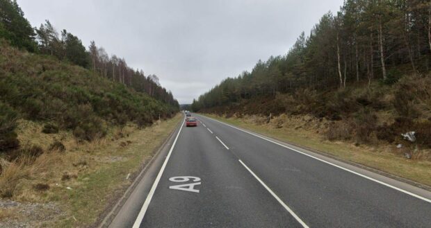 A9 road near Carrbridge with cars on it.