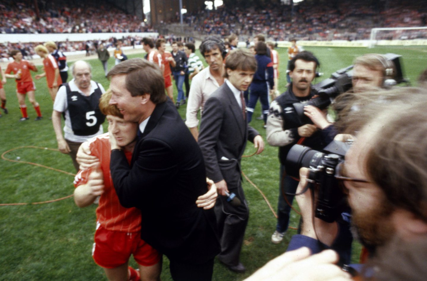 Aberdeen manager Alex Ferguson celebrates with Gordon Strachan after winning the Scottish Cup against Celtic at Hampden in 1984. 