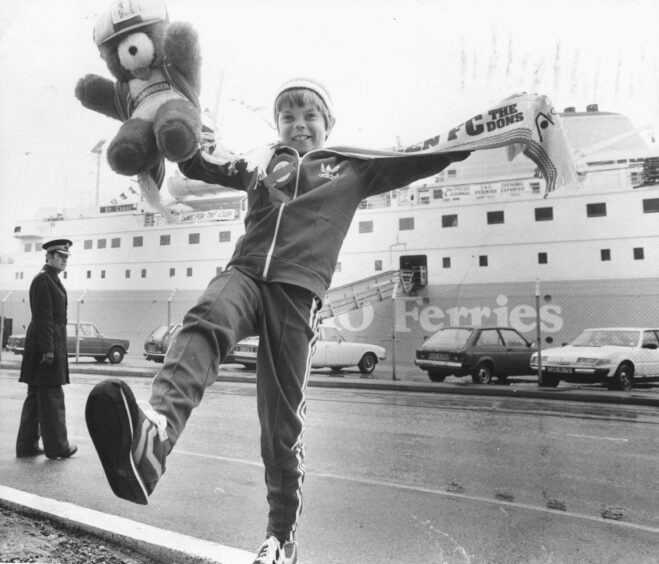 Portsoy fan Gavin Goodbrand and his teddy bear mascot all set to board the St Clair. Image: DC Thomson.