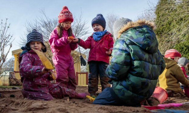 Children playing in the Amber kindergarten sand after it received top marks at an inspection. Image: korero.