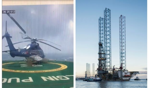 Helicopter on oil rig platform.