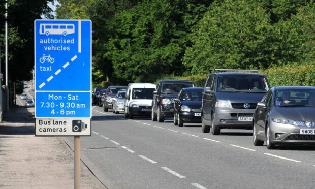 An artist's impression of what bus lane signs on the A93 North Deeside Road could look like. Our readers are less than impressed by the idea. Image: DC Thomson.