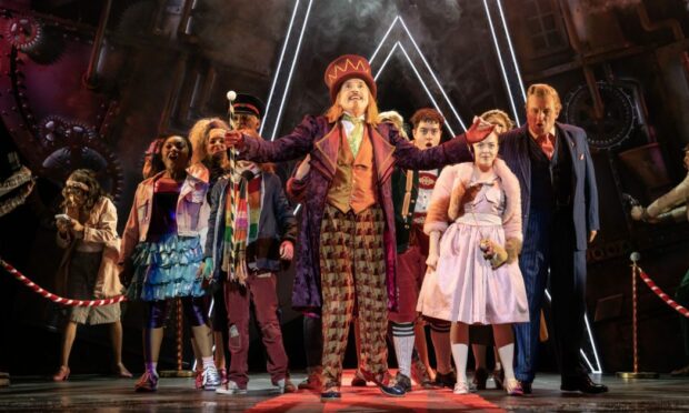 Gareth Snook, centre, plays Willie Wonka in Charlie And The Chocolate Factory, arriving at HIs Majesty's Theatre next week. Image: Aberdeen Performing Arts