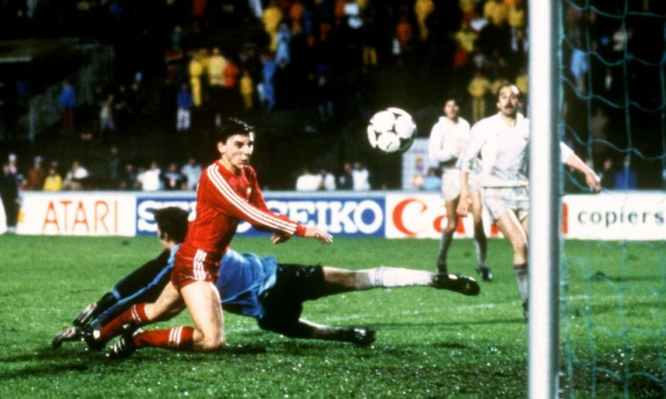 John Hewitt scores Aberdeen's most famous goal - which won the European Cup Winners' Cup against Real Madrid in Gothenburg in 1983. Image: PA.