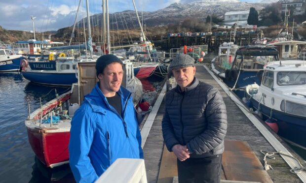 Councillor John Finlayson (right) with Kyleakin fisherman Angus Graham. Skye fishermen are concerned over plans to ban fishing in 10% of Scottish waters. Image: John Finlayson