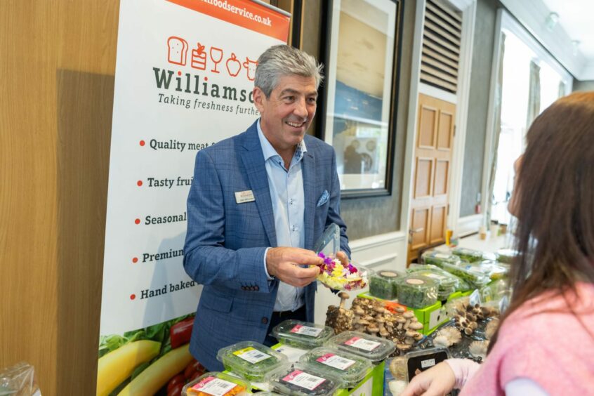 Gary Williamson at trade show stand