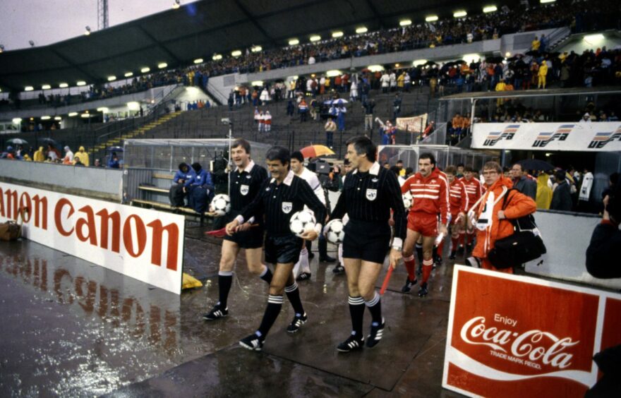 The match officials lead out the Dons and Real Madrid players in the Ullevi Stadium, Gothenburg. Image: Aberdeen Journals