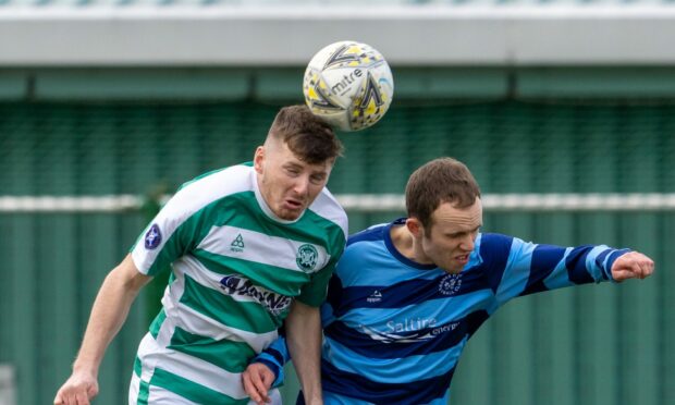 Buckie Thistle's Cohen Ramsay, left, challenges Michael Philipson of Banks o' Dee