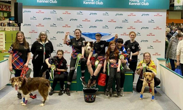 Erin and Abbie Laing from Aboyne are part of the tartan Tails who came third in the Young Kennel Club Flyball showdown at Crufts this weekend. Image: Lynne Laing.