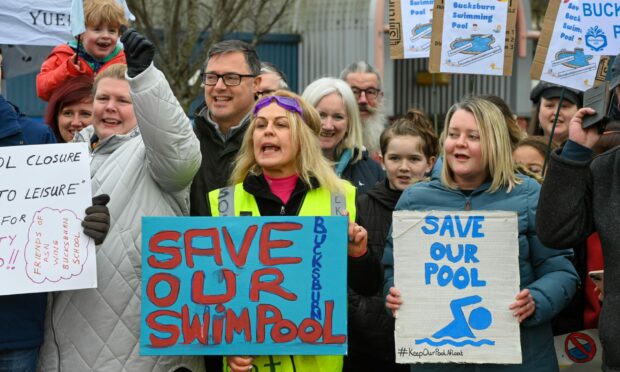 Protestors gathered outside closure-threatened Bucksburn Pool on Sunday while dozens more demonstrated opposition to planned library closures earlier this week. Image: Kenny Elrick/DC Thomson.