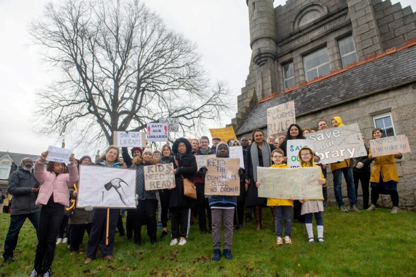 Dozens turned out at a Save Woodside Library demonstration on Saturday. The city's oldest library is one of six threatened with closure. Image: Kath Flannery/DC Thomson.