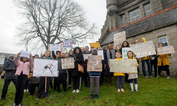 Dozens turned out at a Save Woodside Library demonstration on Saturday. The city's oldest library is one of six threatened with closure. Image: Kath Flannery/DC Thomson.