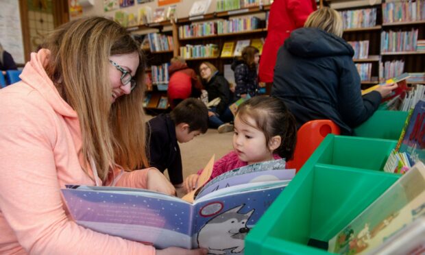 Sarah Wang with her daughter Luna at Ferryhill Library's farewell event. Image: Kath Flannery/DC Thomson.