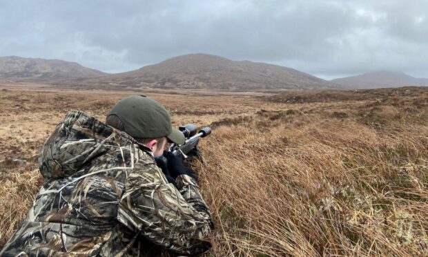 A deer stalker on South Uist. There is a growing debate in the community over whether to eradicate the island's deer population. Image: Stòras Uibhist.