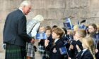 King Charles and Queen consort Camilla with Robert Gordon's College pupils at the official opening of Aberdeen Art Gallery back in 2021. Image: Kami Thomson/DC Thomson