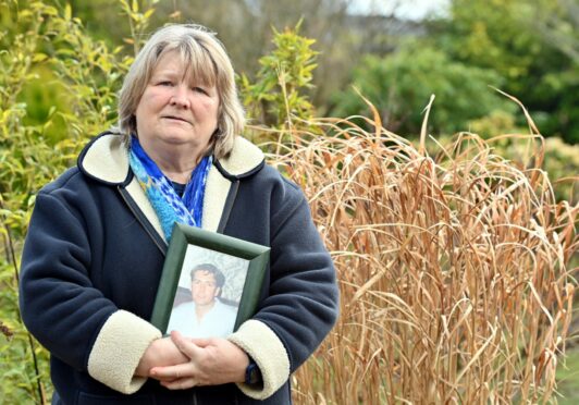 Sandra Geddes with a picture of her brother Alan Geddes.