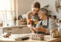 Mother and daughter in kitchen.