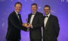 l-r Daniel Davidson, chief operating officer of award sponsor Frontier Energy Network, significant contribution winner Colin Black and Kenny McAllister, chairman of the OAAs. Aberdeen. Image: Rory Raitt