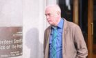 Douglas Boal admitted stalking his co-worker at Aberdeen Sheriff Court. Photo of Douglas outside court. Image: DC Thomson