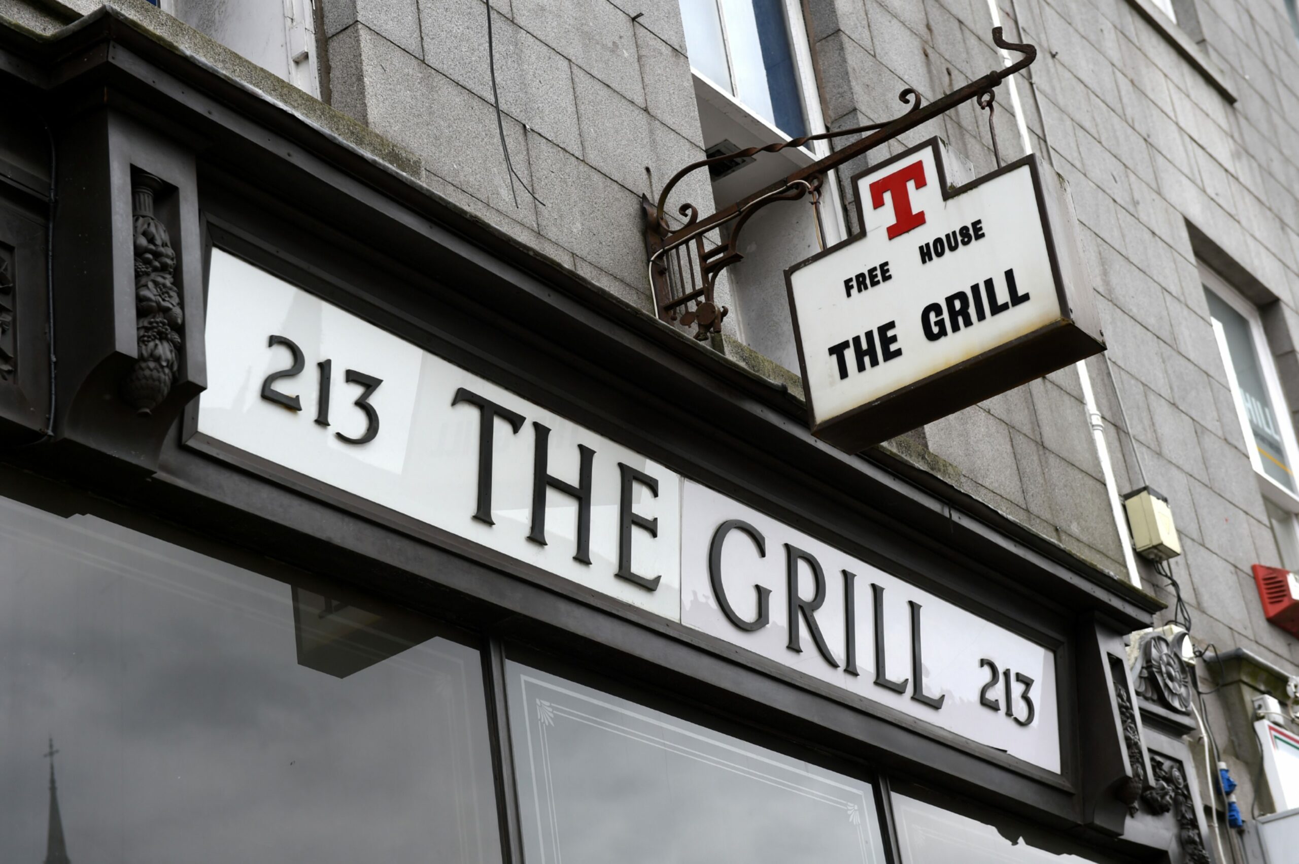 Restaurant sign of The Grill in Union Street, Aberdeen.