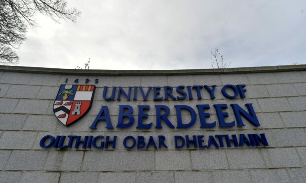 Aberdeen University wall sign outside Old Aberdeen campus.