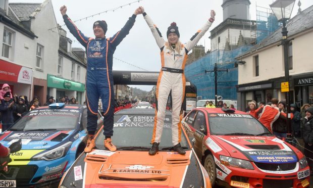 Driver Jock Armstrong and co-driver Hannah McKillop celebrate their win at the 2023 Snowman Rally. Image: Sandy McCook/DC Thomson.
