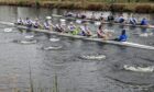 The club eights from St Andrew Boat Club from Edinburgh and the University of St Andrews Boat Club race the last few metres to the finishing line. Images: Courtesy of Inverness Rowing Club