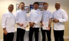 James Martin, centre, congratulates Alex Rothnie, second left, and other winners of the Birmingham final of the Roux Scholar 2023. Image: Anna Lythgoe