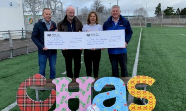 Ruathy Donald, CHAS Community Fundraiser, with members of the Inverness Business Fives Group Brian Colgan, Derek Dodds, and Ron Cruikshank.