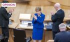 Outgoing First Minister Nicola Sturgeon before leaving the main chamber after her last First Minster's Questions (Image: Jane Barlow/PA)