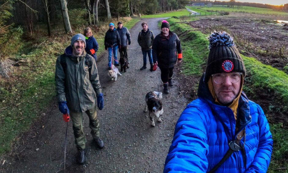 PawPalz members Toby, Irene, Lindy, Alistair, Seth, Helen and Ralph out with their dogs. Image: Ralph Greig. 