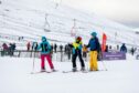 Skiers at Lecht Ski Centre.