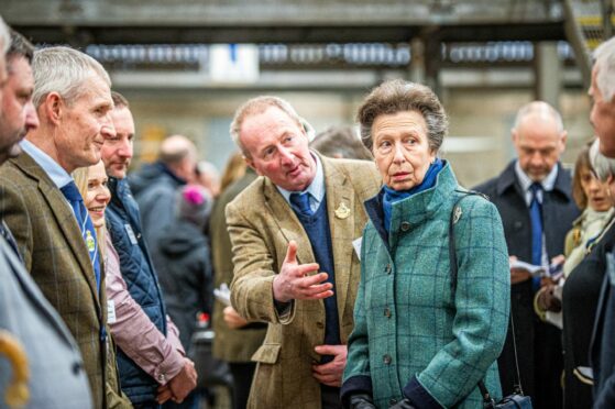 John Gordon, from Huntly, introduces Princess Anne to the Royal Northern Agricultural Society board of directors at the Spring Show. Pictures by Wullie Marr.
