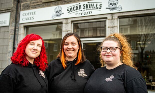 Fom left to right, Jenna Branley, Andrea Gabor and Shannon McIntosh outside the newly-opened Sugar Skulls & Cream in Aberdeen. Image: Wullie Marr/DC Thomson