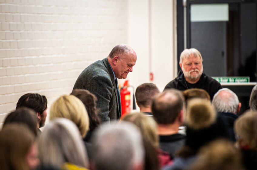 Aberdeen Labour leader Barney Crockett takes his seat at a meeting on the future of Bucksburn swimming pool. To his right is fellow Dyce, Bucksburn and Danestone Labour councillor Graeme Lawrence. Image: Wullie Marr/DC Thomson.