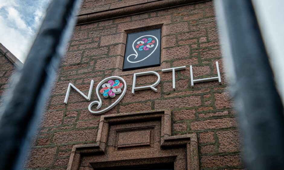 Sign on exterior of North.