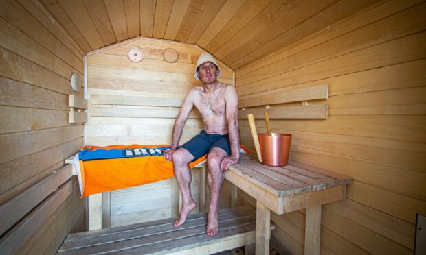 Outdoor enthusiast Dave Jacobs has converted a horse box into a sauna at Stonehaven Harbour. 
Image: Wullie Marr /DC Thomson.