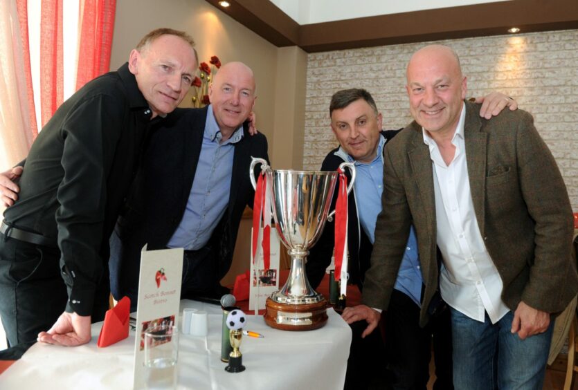 Gothenburg Greats, from left, Jim Leighton, Neil Simpson, John Hewitt and Neale Cooper with the trophy. Image: Kath Flannery / DC Thomson.